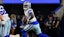 Dallas Cowboys quarterback Joe Milton III (10) runs with the ball.