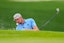 Bryson DeChambeau hits out of a bunker on the fifth hole during a practice round for the PGA Championship golf tournament at Quail Hollow.
