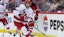  Carolina Hurricanes center Sebastian Aho (20) skates with the puck.