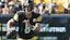Pittsburgh Steelers quarterback Aaron Rodgers (8) scrambles with the ball.