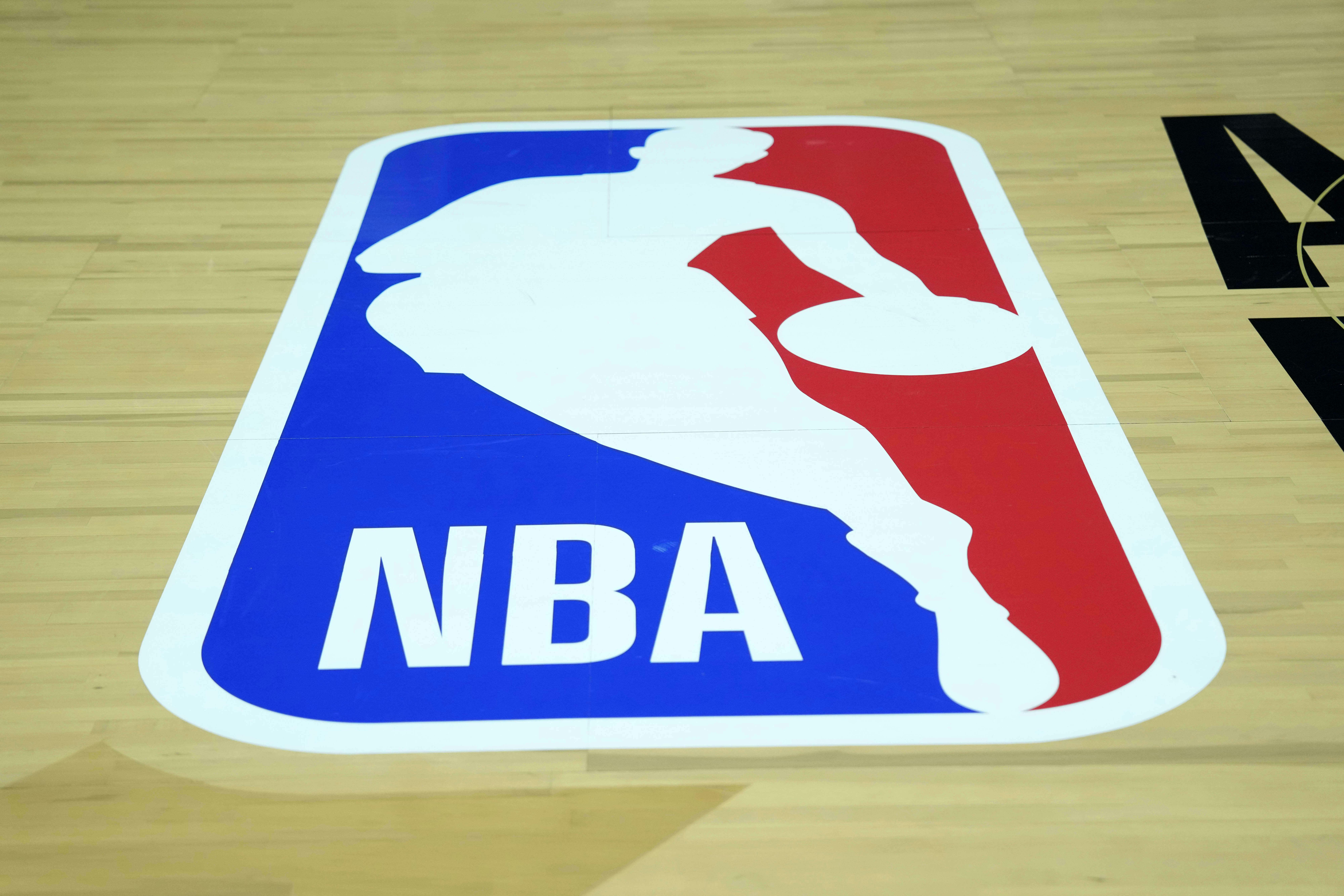 The NBA logo on the court at Huntsman Center. Mandatory Credit: Kirby Lee-Imagn Images