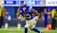 Los Angeles Rams running back Kyren Williams (23) rushes the ball.