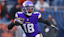 Minnesota Vikings wide receiver Justin Jefferson (18) runs after a catch against the Chicago Bears during overtime at Soldier Field.