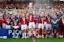 Wrexham's James McClean lifts the trophy after the Sky Bet League One match at SToK Racecourse, Wrexham. Picture date: Saturday April 26, 2025. (Photo by Martin Rickett/PA Images/Alamy Images/Sipa USA)