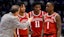 Arkansas Razorbacks head coach John Calipari talks with guard D.J. Wagner (21), forward Karter Knox (11), and guard Johnell Davis (1).