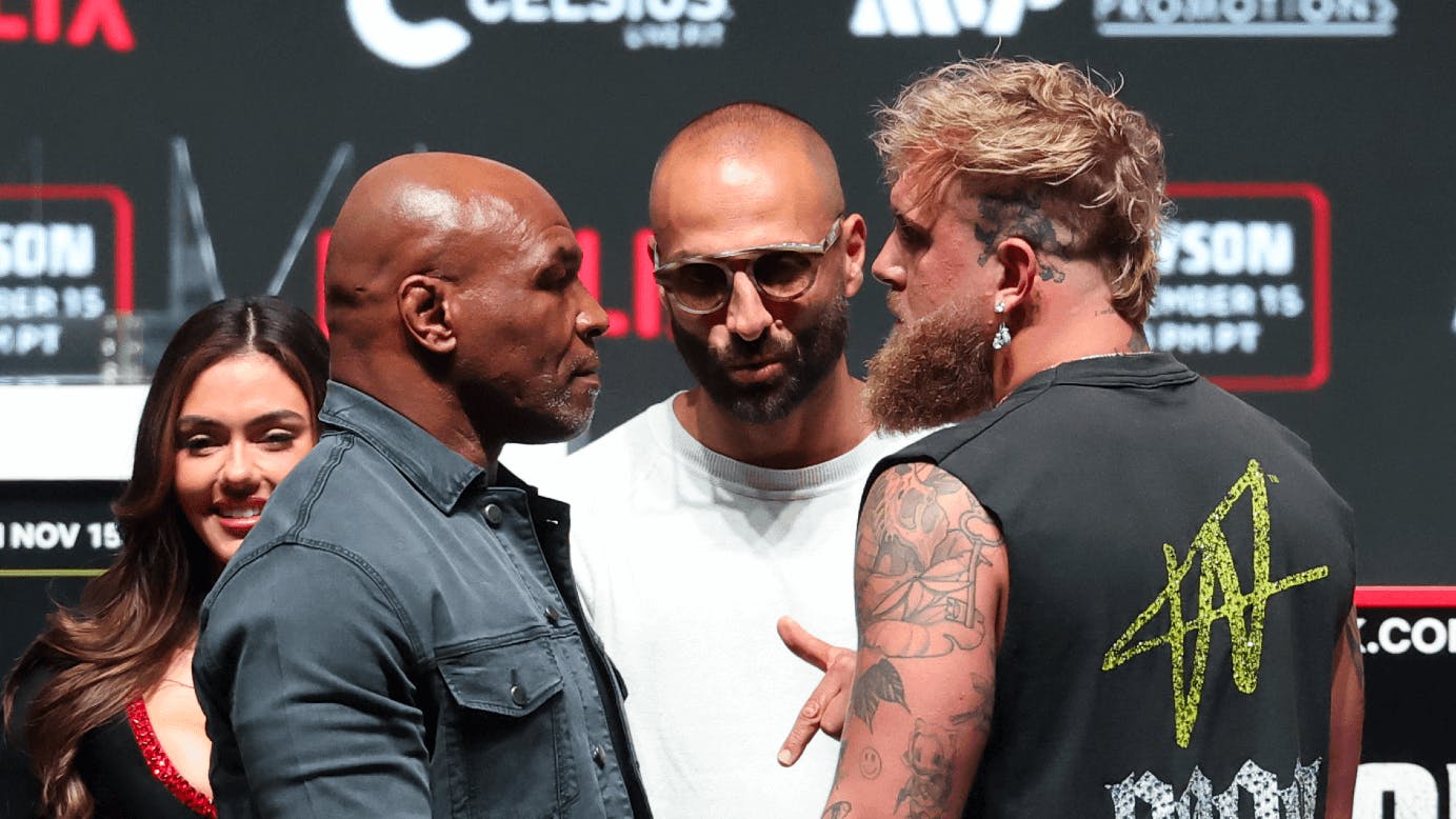 Jake Paul (right) faces off with Mike Tyson after their press conference at The Pavilion at Toyota Music Factory. Mandatory Credit: Kevin Jairaj-Imagn Images