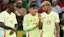 Spain's Nico Williams (l-r), Pedri and Lamine Yamal speak on the pitch.