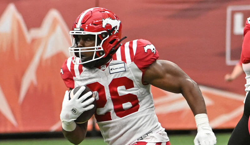Calgary Stampeders running back Dedrick Mills (26).