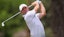 Rory McIlroy plays his shot from the second tee during the first round of the TOUR Championship.