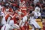 Kansas City Chiefs quarterback Patrick Mahomes (15) passing against the Buffalo Bills during overtime in the AFC Divisional playoff football game at GEHA Field at Arrowhead Stadium.