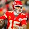 Kansas City Chiefs quarterback Patrick Mahomes (15) rolls out to pass.