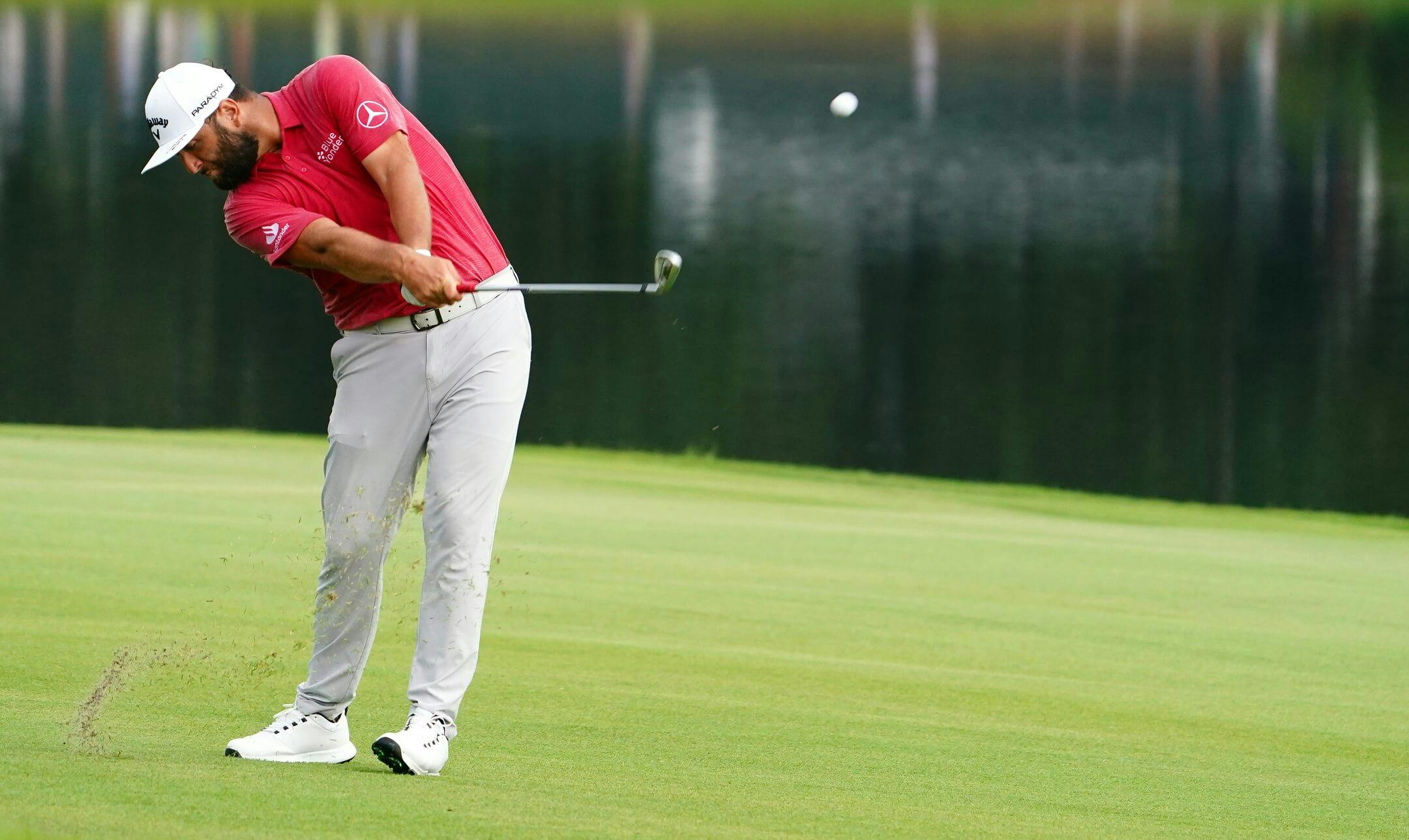 Jon Rahm plays his fairway shot on the eighth hole during the final round of the TOUR Championship golf tournament at East Lake Golf Club. Mandatory Credit: John David Mercer-USA TODAY Sports