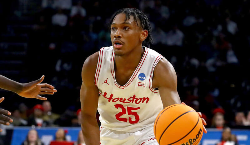 Houston Cougars guard Mercy Miller (25) dribbles in the second half.