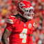 Kansas City Chiefs wide receiver Rashee Rice (4) celebrates after scoring a touchdown against the Las Vegas Raiders during the first quarter of the game at GEHA Field at Arrowhead Stadium.