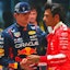 Red Bull Racing driver Max Verstappen of The Netherlands (1) greets Scuderia Ferrari driver Carlos Sainz Jr. of Spain
