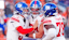 Jaxson Dart, Theo Johnson, and Andrew Thomas react after a play.