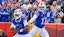 Buffalo Bills quarterback Josh Allen hands the ball off to Buffalo Bills running back James Cook
