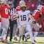 Michigan quarterback Davis Warren (16) celebrates a first down against Ohio State during the second half at Ohio Stadium in Columbus, Ohio on Saturday, Nov. 30, 2024.