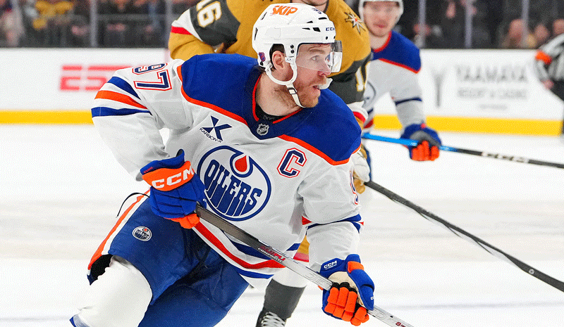 Connor McDavid (97) controls the puck against the Vegas Golden Knights.