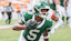 New York Jets wide receiver Garrett Wilson (5) runs with the ball against the Tampa Bay Buccaneers during the second half at Raymond James Stadium.