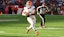 Cleveland Browns quarterback Dillon Gabriel (8) runs with the ball.