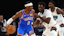 Oklahoma City Thunder guard Shai Gilgeous-Alexander (2) dribbles as Memphis Grizzlies guard Vince Williams Jr. (5) defends.