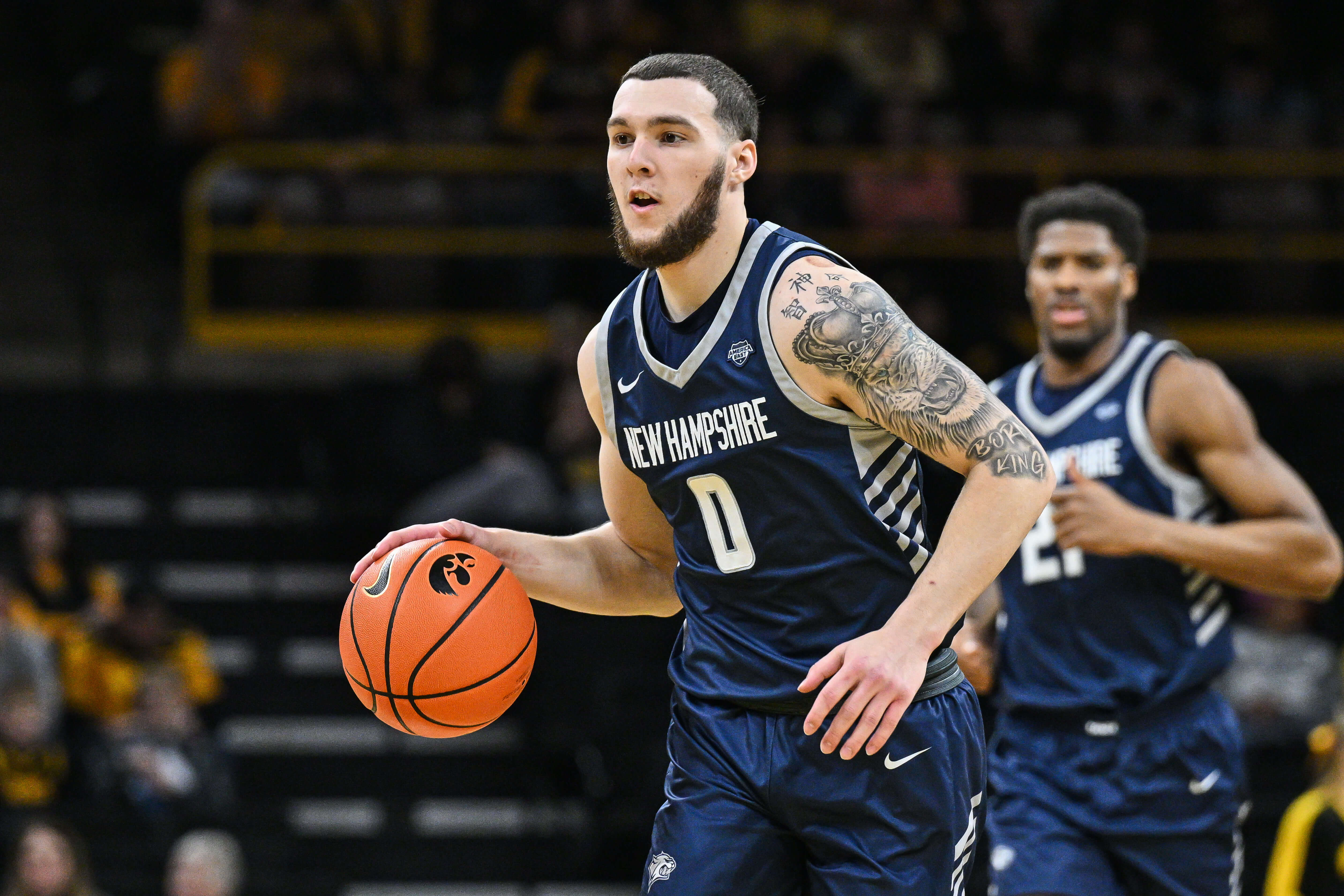 New Hampshire Wildcats guard Sami Pissis (0) brings the ball up court against the Iowa Hawkeyes during the first half at Carver-Hawkeye Arena. Mandatory Credit: Jeffrey Becker-Imagn Images