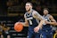 New Hampshire Wildcats guard Sami Pissis (0) brings the ball up court against the Iowa Hawkeyes during the first half at Carver-Hawkeye Arena. Mandatory Credit: Jeffrey Becker-Imagn Images