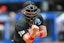 Home plate umpire Ryan Blakney (36) calls a strike during a game between the Cleveland Guardians and the Los Angeles Angels at Progressive Field. David Richard-Imagn Images