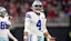 Dallas Cowboys quarterback Dak Prescott (4) reacts to a penalty.