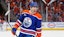 Edmonton Oilers defensemen Evan Bouchard (2) celebrates after scoring a goal.