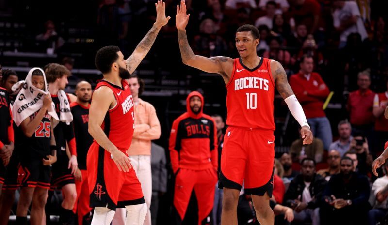 Houston Rockets guard Fred VanVleet (5) congratulates Houston Rockets forward Jabari Smith Jr (10).