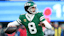 New York Jets quarterback Aaron Rodgers (8) drops back to pass against the Los Angeles Rams.