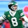New York Jets quarterback Aaron Rodgers (8) drops back to pass against the Los Angeles Rams.