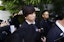 Ippei Mizuhara, the former interpreter for Los Angeles Dodgers star Shohei Ohtani, is surrounded by the media in front of a federal district court in Los Angeles on May 14, 2024.