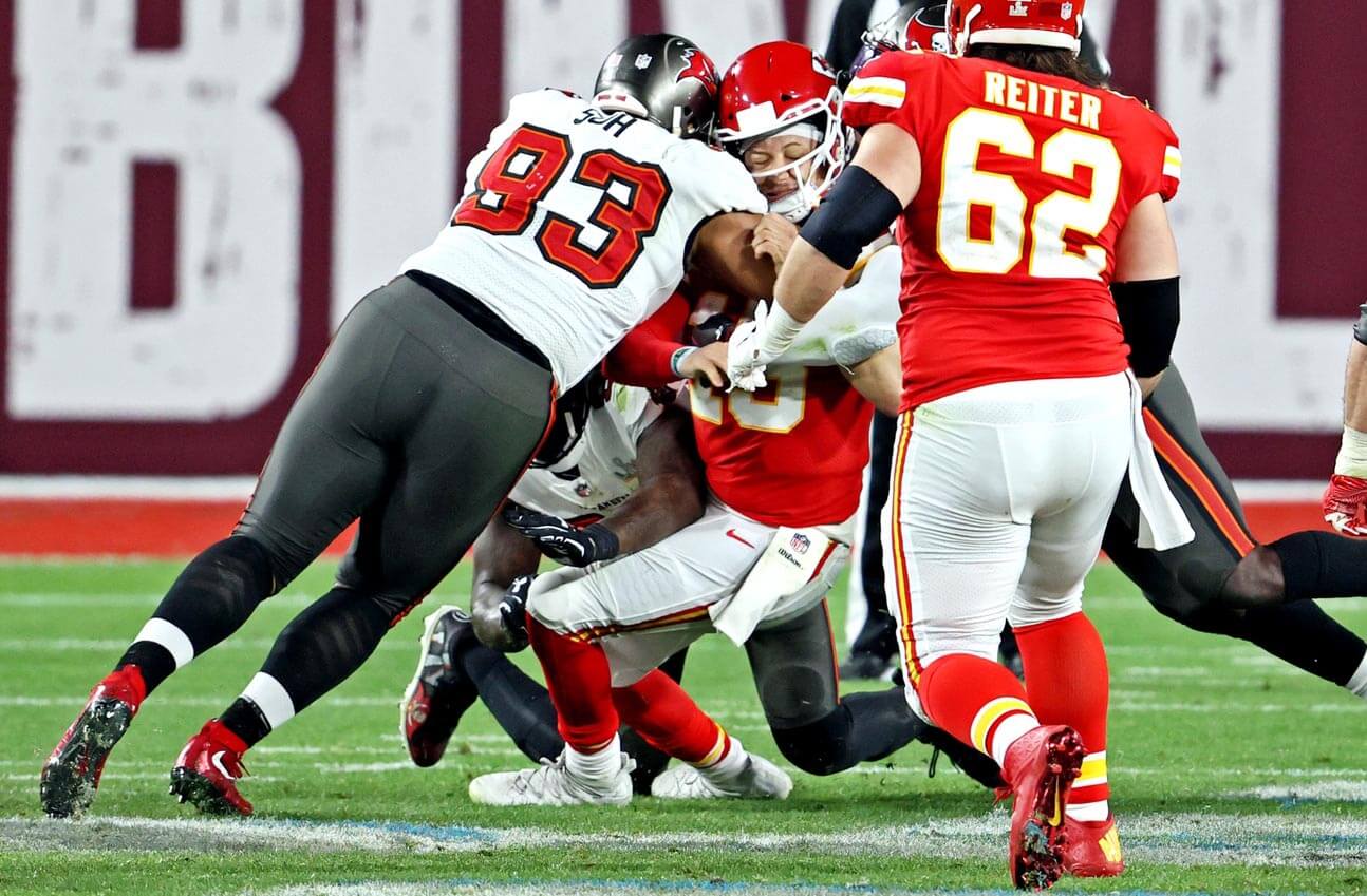 Kansas City Chiefs quarterback Patrick Mahomes (15) is sacked by Tampa Bay Buccaneers defensive end Ndamukong Suh (93) during the fourth quarter in Super Bowl LV at Raymond James Stadium.