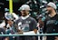 Philadelphia Eagles quarterback Jalen Hurts (1) holds the Vince Lombardi Trophy as Philadelphia Eagles head coach Nick Sirianni looks on after defeating the Kansas City Chiefs in Super Bowl LIX at Ceasars Superdome. Mandatory Credit: Mark J. Rebilas-Imagn 