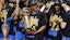 Oklahoma City Thunder forward Jalen Williams (8) holds the NBA Larry O'Brien Championship Trophy.