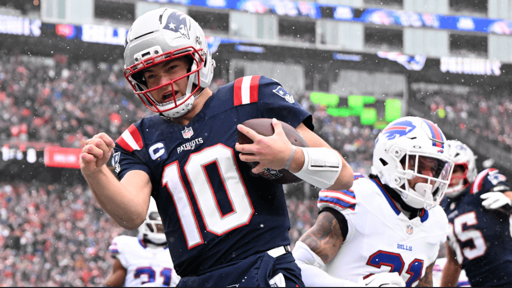New England Patriots quarterback Drake Maye (10) runs for a touchdown against the Buffalo Bills.