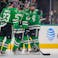 Dallas Stars defenseman Esa Lindell (23) and defenseman Miro Heiskanen (4) and left wing Michael Raffl (18) and center Luke Glendening (11) and right wing Denis Gurianov (34) celebrate a goal by Raffl against the Colorado Avalanche during the first period 