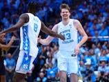 North Carolina center Henri Veesaar (13) celebrates with North Carolina forward Caleb Wilson (8) after making a dunk. NCAA basketball game against Notre Dame and at Dean Smith Center, Chapel Hill, North Carolina. David Beach/CSM/Sipa USA 