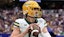 Baylor Bears quarterback Sawyer Robertson (13) warms up on the sideline.