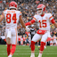 Kansas City Chiefs wide receiver Justin Watson (84) celebrates an 11-yard touchdown with quarterback Patrick Mahomes (15).