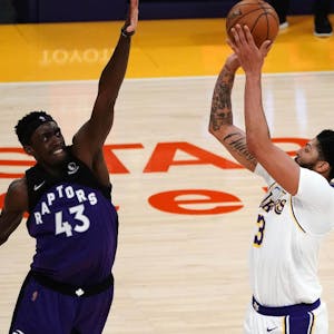 Los Angeles Lakers forward Anthony Davis (3) shoots against Toronto Raptors forward Pascal Siakam (43) during the first half at Staples Center.