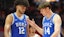 Duke forward Cameron Boozer (12) and guard/forward Nikolas Khamenia (14).