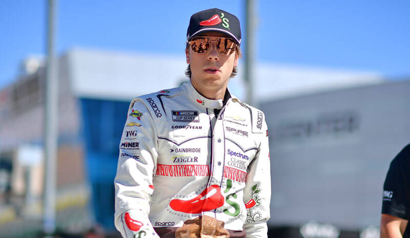 Spire Motorsports driver Carson Hocevar (77).