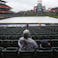 Rain causes a delay for MLB action at Coors Field.
