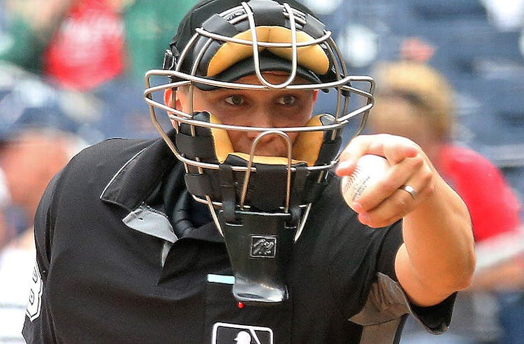 An umpire calls a strike in MLB action.