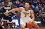 Purdue's Carsen Edwards handles the ball against Villanova in NCAA March Madness action.  