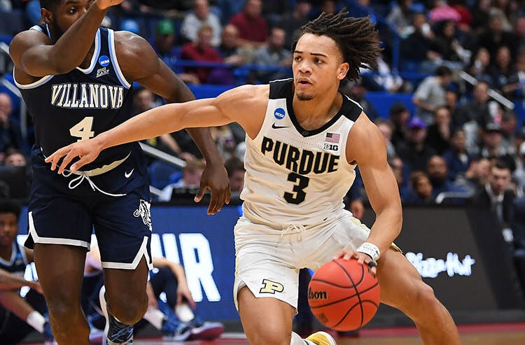 Purdue's Carsen Edwards handles the ball against Villanova in NCAA March Madness action.  